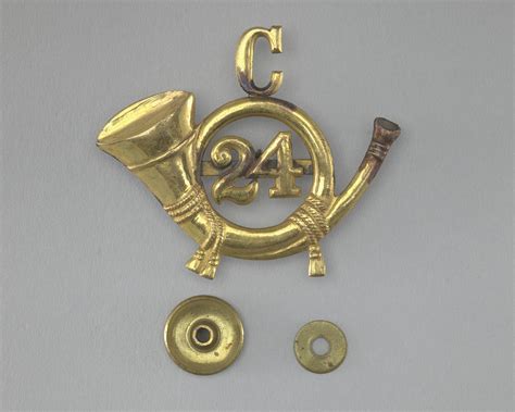 Insignia from the 24th Infantry Regiment, Company C | Smithsonian Institution