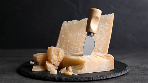 The Reason Parmigiano Reggiano Cheese Isn T Served Neatly Sliced