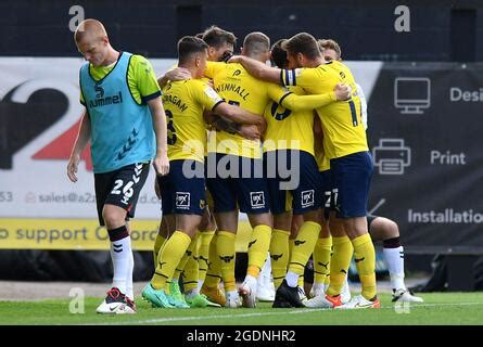 Oxford United players celebrate after the final whistle the Bolton ...