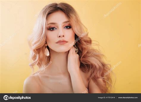 Beautiful Young Model Blonde Close Up Portrait Girl With Professional Makeup And Hairstyle