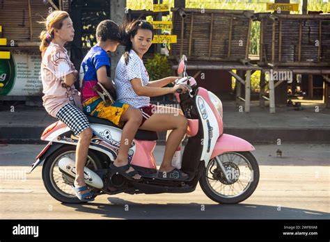 Samut Prakan Thailand Dec Two Women Ride A Motorcycle With A