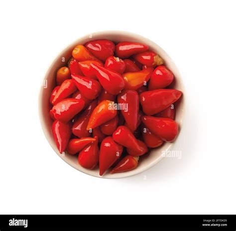 Pickled Small Red Hot Peppers In A Bowl Isolated On White Background