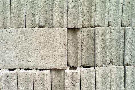 Premium Photo Close Up Cement Grey Bricks Out Of The Pile With