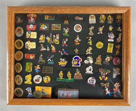 Framed Disney Enamel Pins Matthew Bullock Auctioneers