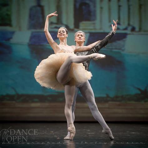 Two Ballerinas In Tutu And Leorboam One Is Holding The Other