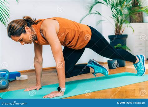 Woman Exercising Doing Mountain Climbers Hiit Or High Intensity