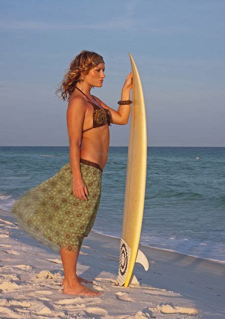 Surfer Girl Woman Wearing Sarong And Bikini Holding Surfboard Gazing