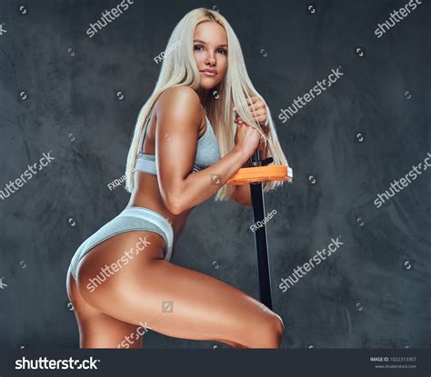 Sexy Blonde Fitness Model Posing Barbell Stock Photo