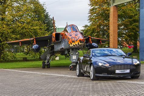 Jaguar And Db9 Aston Martin Db9 Is Watched Over By Sepecat Flickr