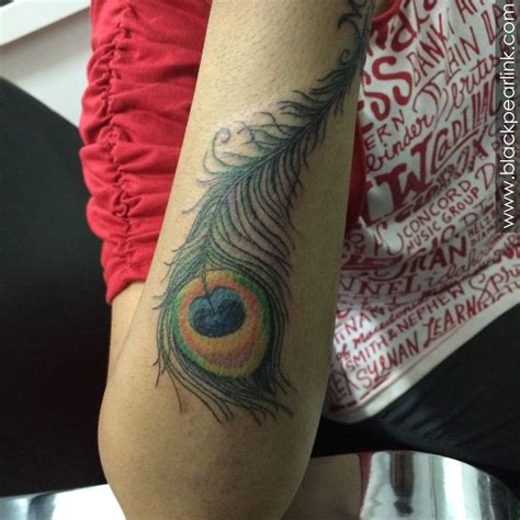 Small Peacock Feather Tattoo On Leg