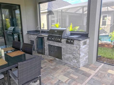 Poolside Custom Outdoor Kitchen Paradise - Elegant Outdoor Kitchens