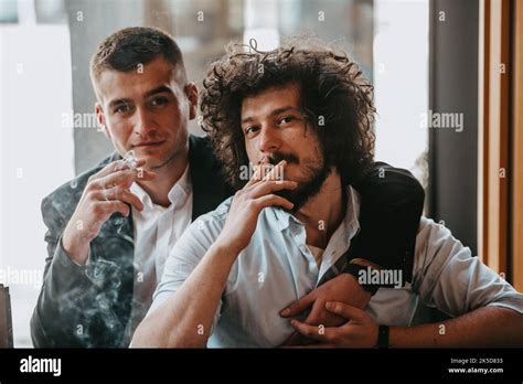 Portrait Of Multiethnic Diverse Gay LGBT Romantic Male Couple Embracing