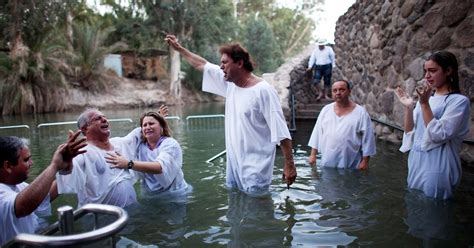 Christian Pilgrims Immerse In Jordan River