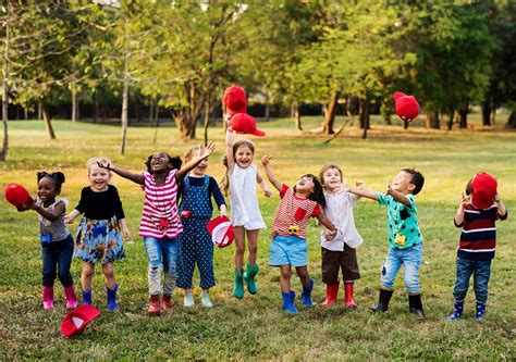 Group of Diverse Kids Playing at the Field Together | Royalty free ...