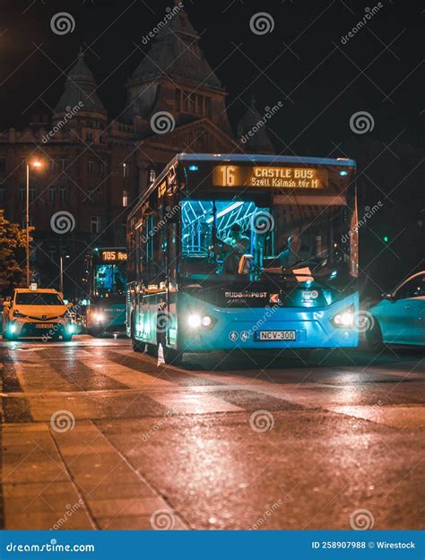 Vertical Shot Of The Number 16 Bus On The Streets At Night In Budapest