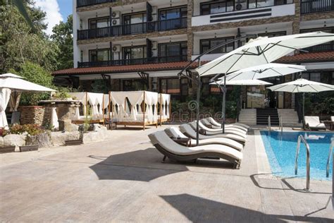 Swimming Pool of Luxury Hotel with Umbrella and Chair Around. Hotel Resort in Bulgaria ...