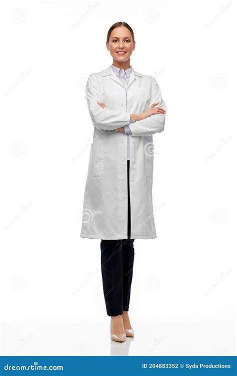 Scientist In A White Lab Coat Putting Vial With A Sample Into