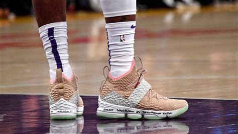 The shoes worn by Los Angeles Lakers forward LeBron James (23) are seen ...