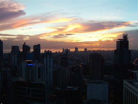 Asisbiz Sunset Philippines Manila Makati Roxas triangle 07