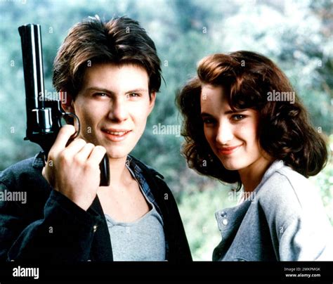 WINONA RYDER and CHRISTIAN SLATER in HEATHERS (1989), directed by ...