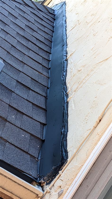 New Roof Flashing Against Wall Rroofing