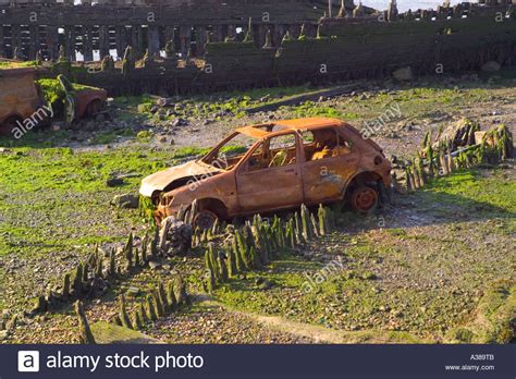 Wrecked Cars On Beach On The Swale Kent Stock Photo Alamy