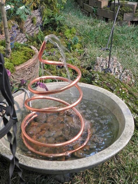 14 Soothing DIY Garden Fountain Ideas • The Garden Glove