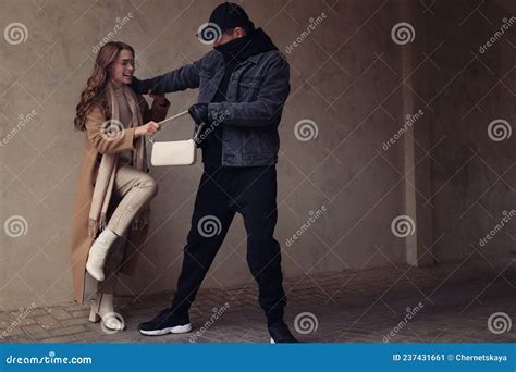 Woman Fighting With Thief While He Trying To Steal Her Bag Outdoors