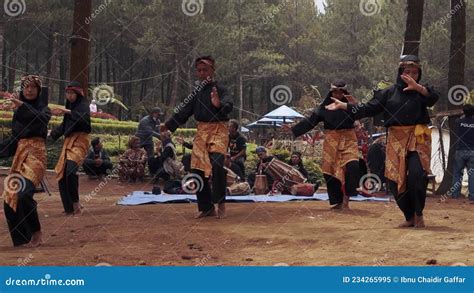 A Group Of Teens Shuffles Their Feet When Doing Martial Art Movement In