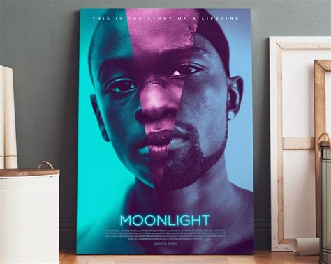 the movie poster for moonlight with two men's faces, one is black and one is blue