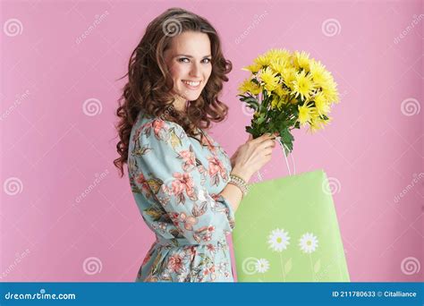 Portrait Of Happy Trendy Woman In Floral Dress On Pink Stock Image