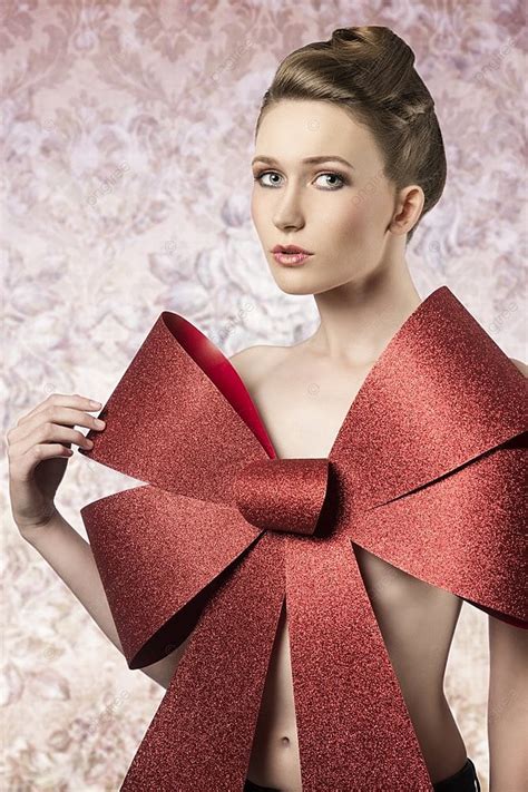 Sensual Woman With Elegant Blonde Hair Style Posing In Christmas Shoot