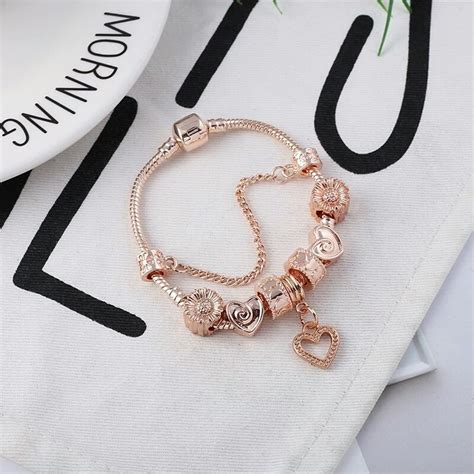 Pulsera Tipo Pandora Con Dijes Rosados En Mercado Libre