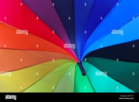 Parasol in all colors of rainbow Stock Photo - Alamy