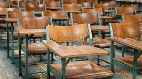 Wooden Lecture Chairs Arranged In The Classroom Empty College Classroom With Many Wooden