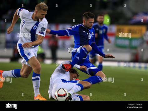 Finland S Paulus Arajuuri Tackles Northern Ireland S Oliver Norwood