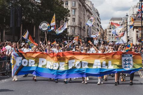 People with Flags and Banners Celebrating London LGBTQ Pride Parade ...