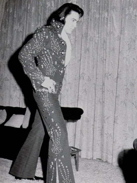 Elvis In His Las Vegas Hilton Suite Showing His New Outfit In January 1972 Elvis Jumpsuits