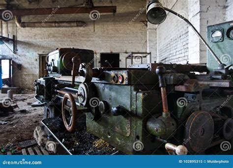 Old Industrial Machine Tool Rusty Metal Equipment In Abandoned Factory