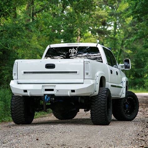 Lifted White Truck Rear View