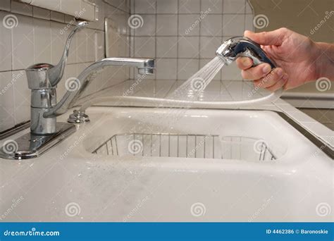 Cleaning the Kitchen Sink stock photo. Image of clean - 4462386