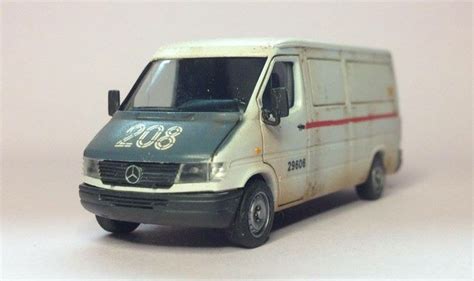 A Toy Van With The Number 208 On It