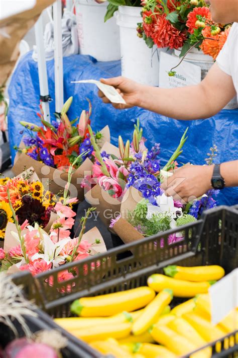 Buying Flowers At Farmers Market Stock Photo Royalty Free FreeImages