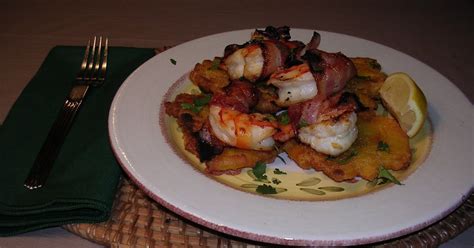 Mrs Mangú Bacon Wrapped Prawns On A Bed Of Tostones