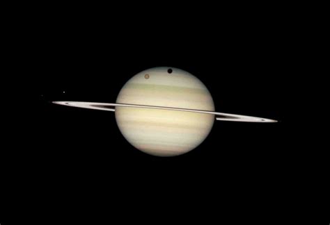 Saturn Moon Transits March 2009 - The Hubble Telescope Photo (22811590 ...