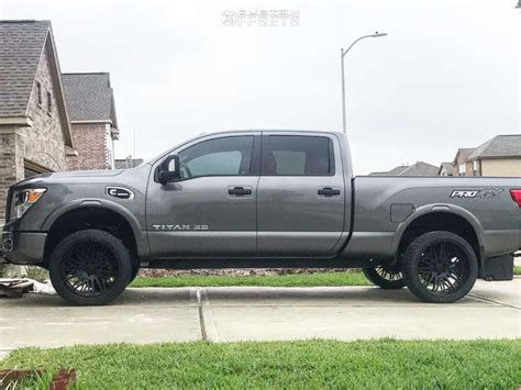 2018 Nissan Titan Xd With 24x12 51 Cali Offroad Rawkon And 30535r24 Atturo Az800 And Leveling