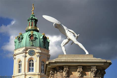 A Naked Statue Above The Entrance Gate Of The Charlottenburg Palace