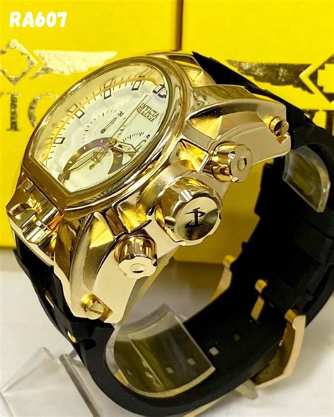 Relógio Masculino Invicta Zeus Magnum Dourado fundo Branco Pulseira de