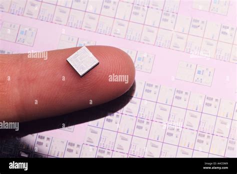 Microchip On Finger Ic Wafer Background Stock Photo Alamy