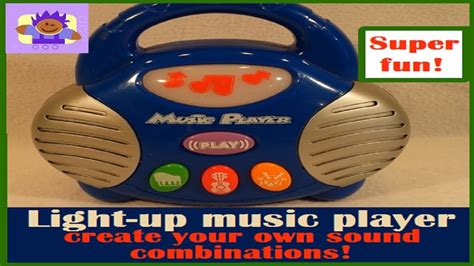 Musical Light Up Player Boom Box Toy Featuring Piano Violin And Drums